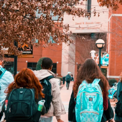 canva-people-wearing-backpacks-MADGwFheKFE